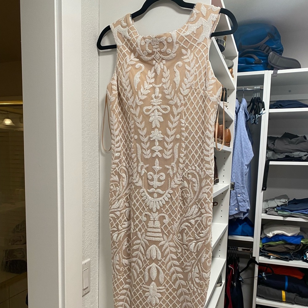 Casual wedding/outfit change. Size 6. Only worn once.
